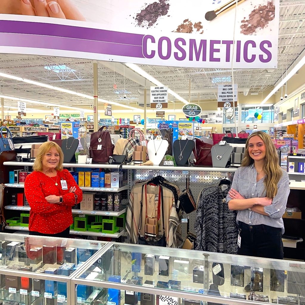 Employees at a the cosmetics counter